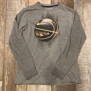 Nike long sleeve grey tee shirt w basketball graphic print on the front
